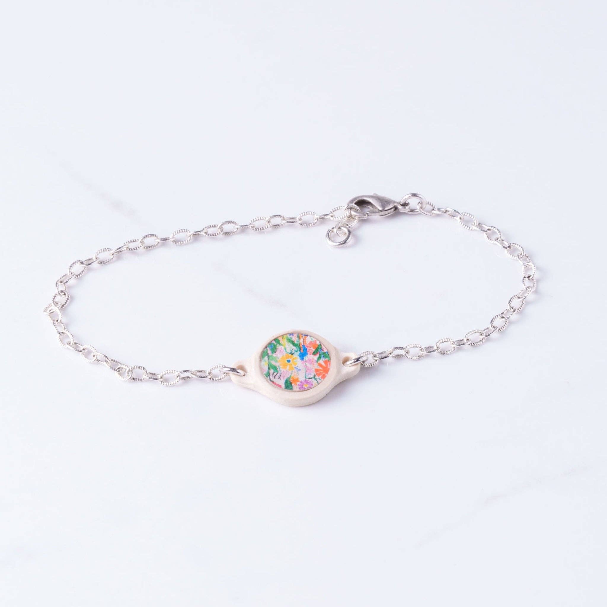 Tap To Pray® Survivor Series Bracelet: .999 Silver - Plated + Wild Flowers - Mercantile213